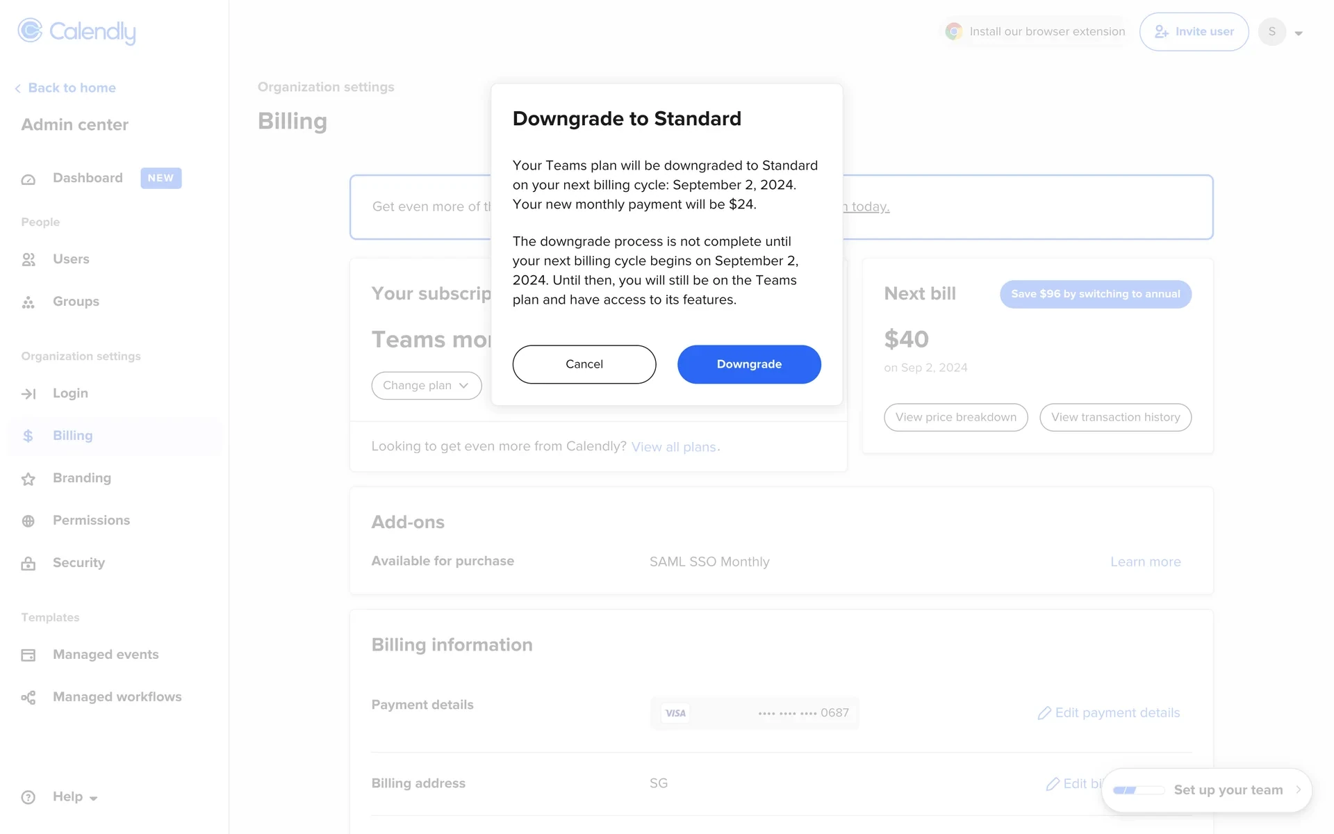 Calendly Downgrade to Standard confirmation modal showing next-cycle date, new monthly payment, Cancel and blue Downgrade buttons