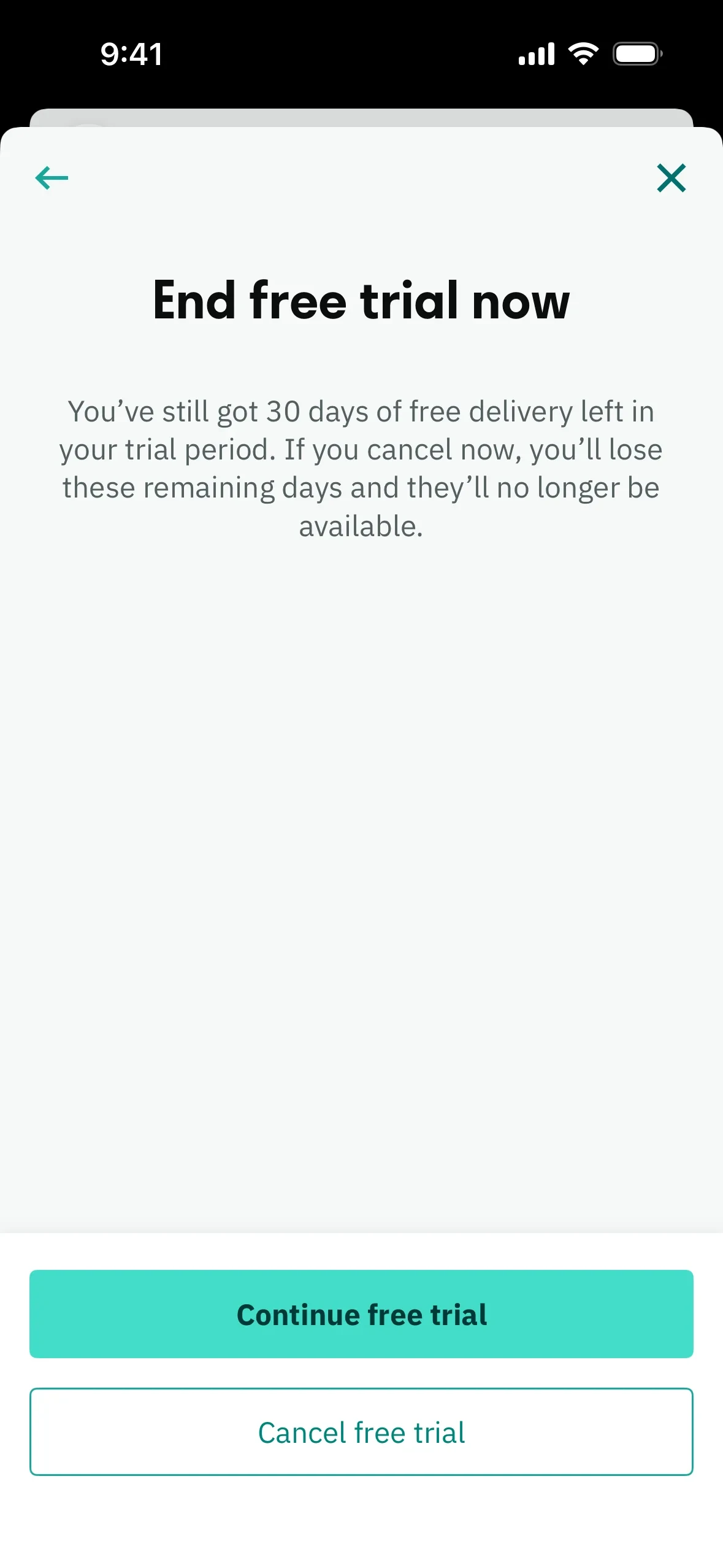 Deliveroo End free trial now screen stating you still have 30 days of free delivery left, with a teal Continue free trial button and an outlined Cancel free trial button below