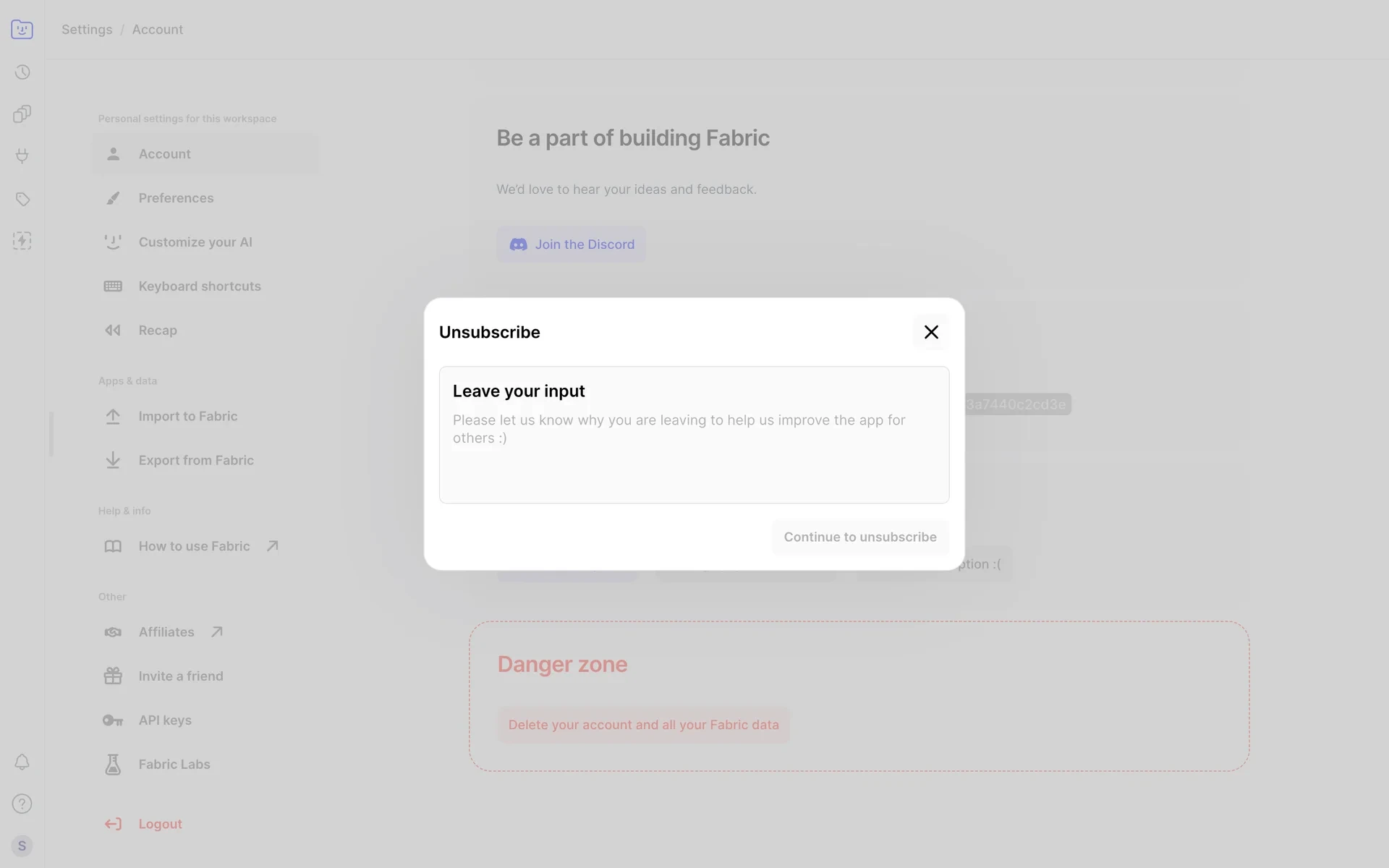 Fabric Unsubscribe dialog with a "Leave your input" prompt asking the user to explain why they are leaving, and a greyed-out Continue to unsubscribe button