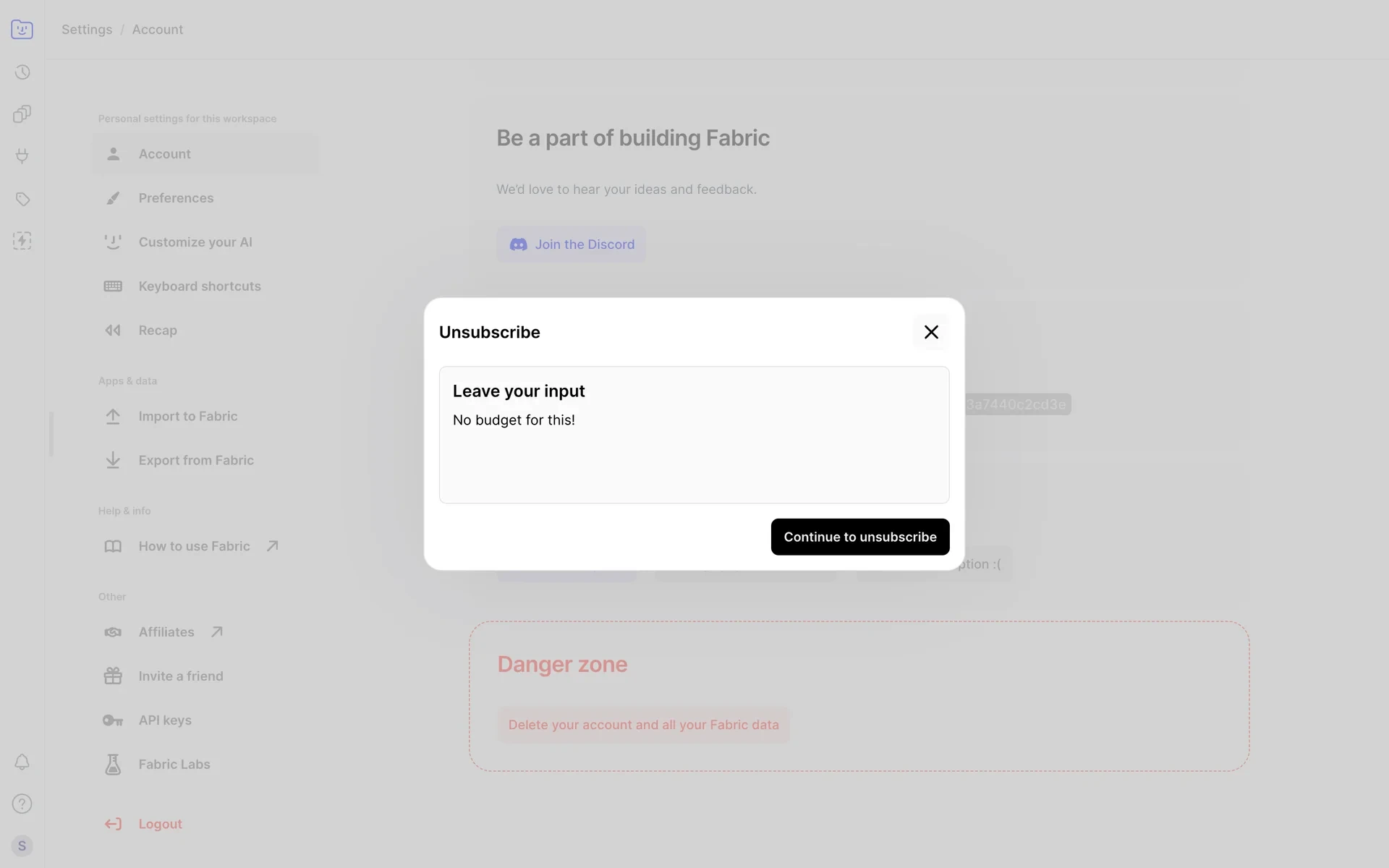 Fabric Unsubscribe dialog with the reason "No budget for this!" typed in and the Continue to unsubscribe button now active in black