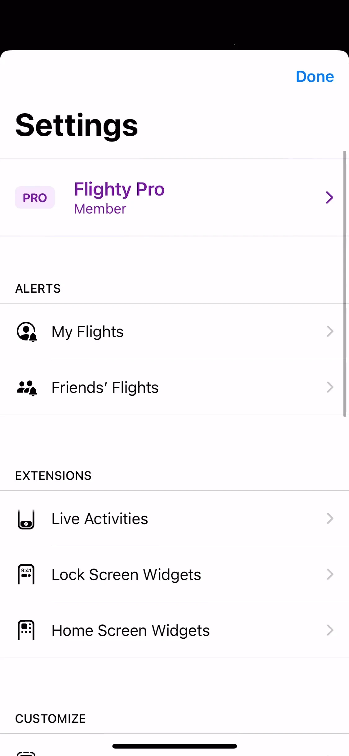 Flighty Settings screen with a purple Flighty Pro Member row at the top, followed by Alerts and Extensions sections