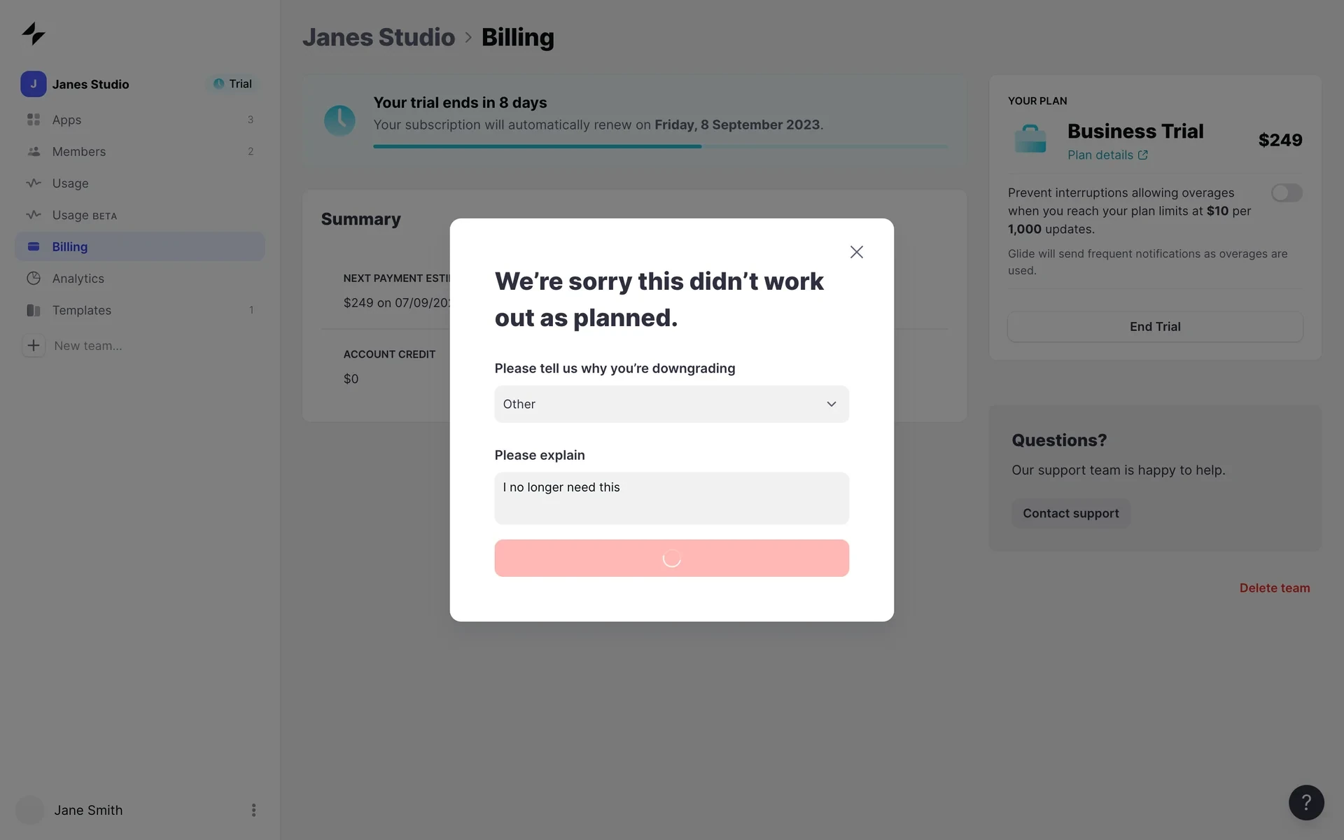 Cancellation modal with the Cancel Plan button showing a white loading spinner on a red background
