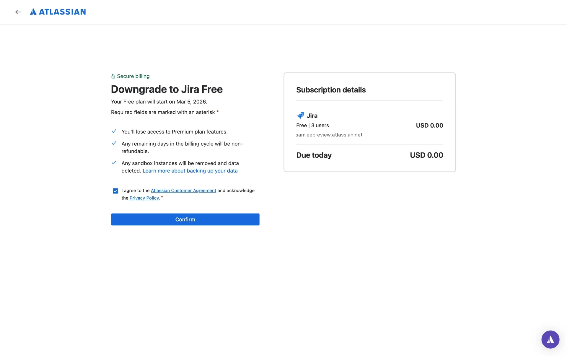 Same downgrade page with the agreement checkbox now ticked and the blue Confirm button enabled