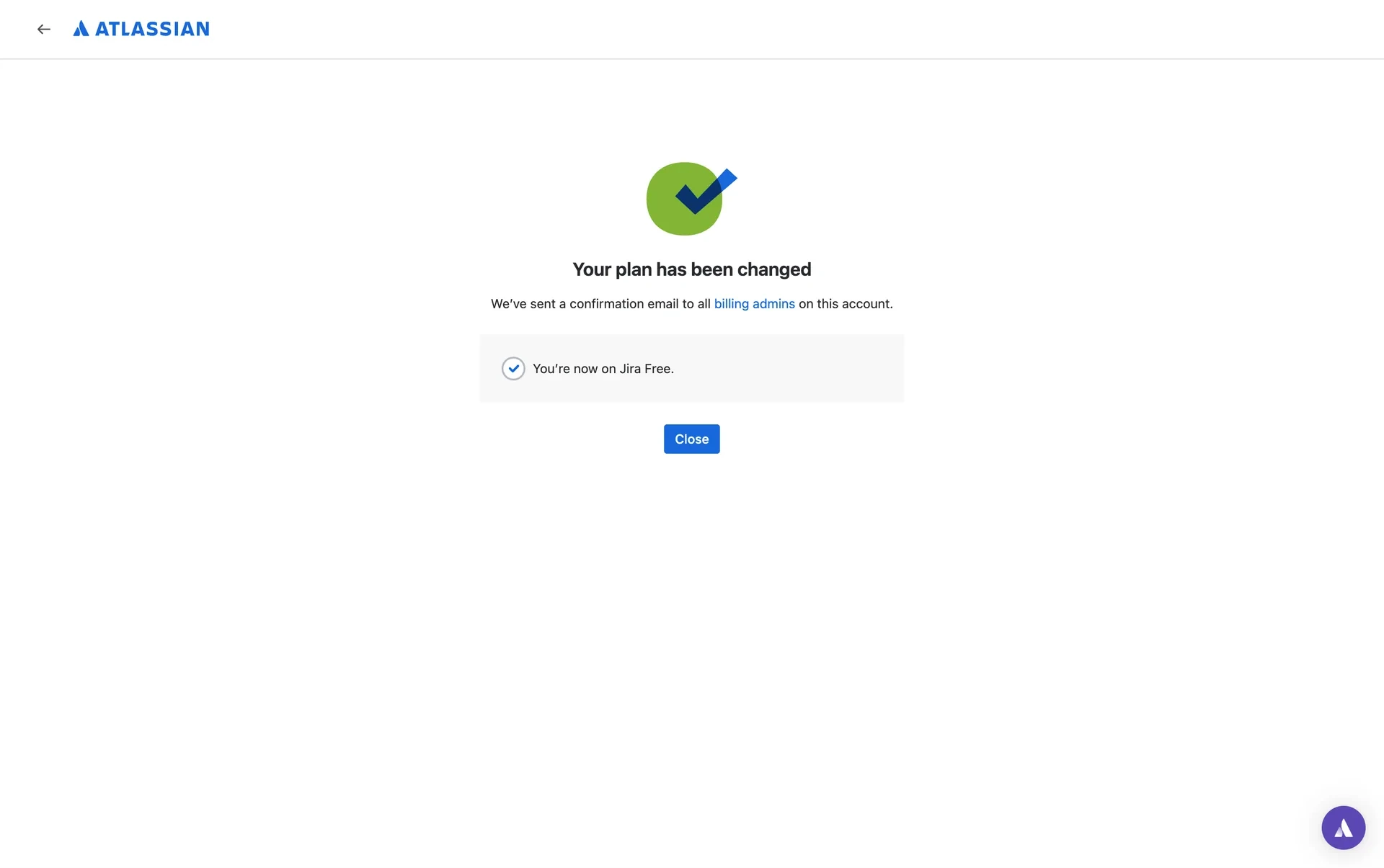 Confirmation page with a green check reading Your plan has been changed and You are now on Jira Free, with a Close button