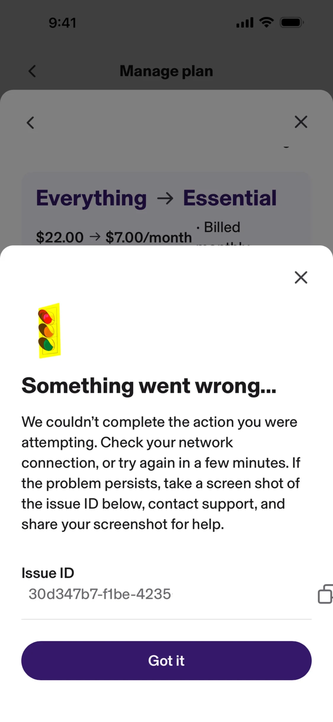 KOHO error modal titled Something went wrong with traffic-light illustration, copy about network retry and contacting support, Issue ID 30d347b7-f1be-4235 with copy control, and a purple Got it button over a Manage plan Everything to Essential background