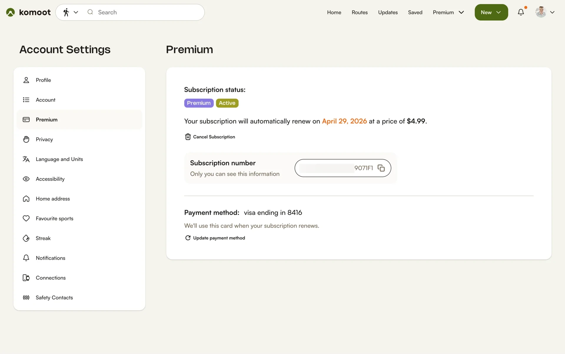 komoot Account Settings Premium tab showing an Active Premium subscription, the automatic renewal date and price, a Cancel Subscription link, the subscription number, and the saved payment method