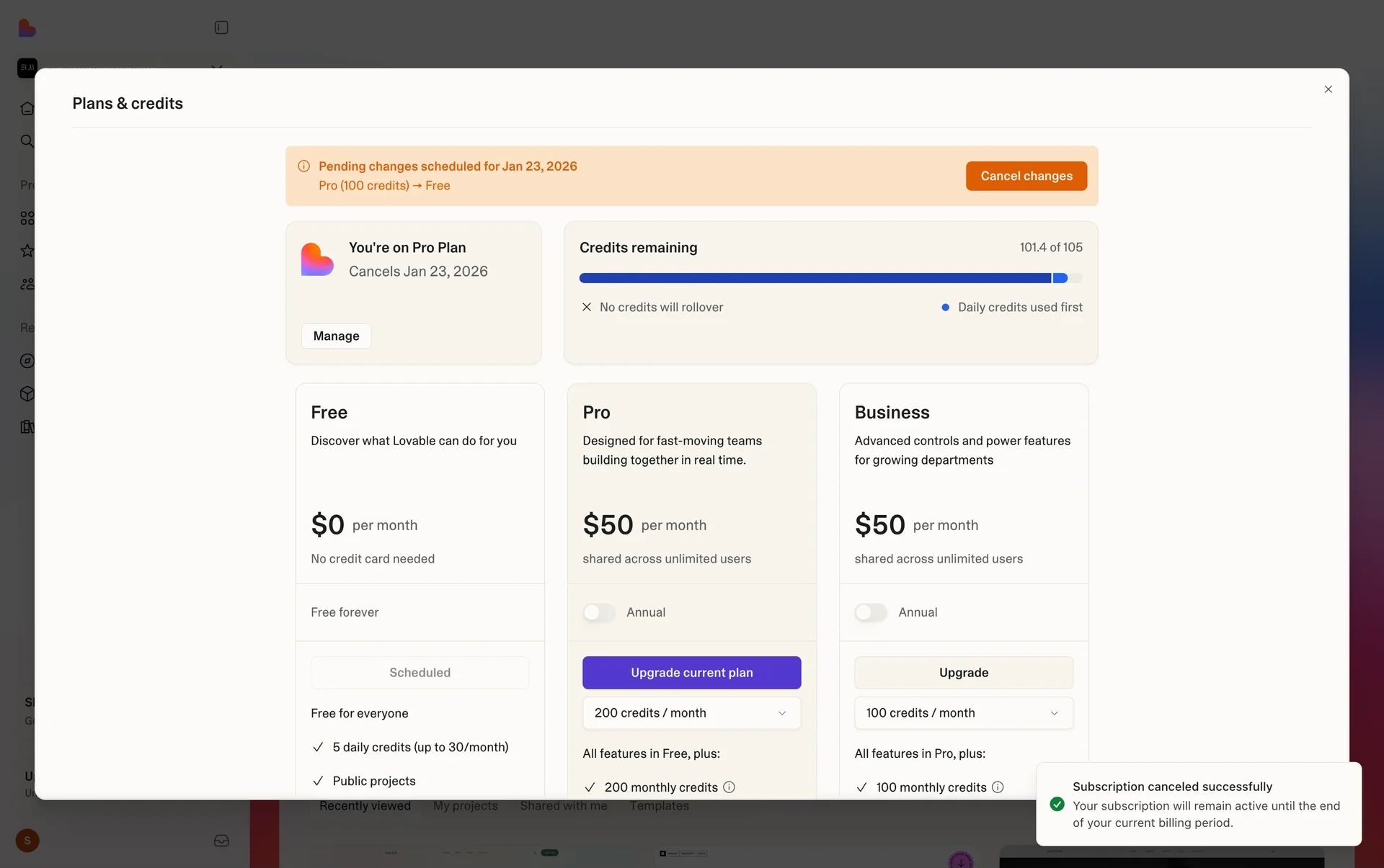 Lovable Plans & credits after downgrade showing an amber "Pending changes scheduled for Jan 23, 2026 — Pro (100 credits) → Free" banner with a Cancel changes button, a plan card reading "Cancels Jan 23, 2026", and a toast "Subscription canceled successfully. Your subscription will remain active until the end of your current billing period."