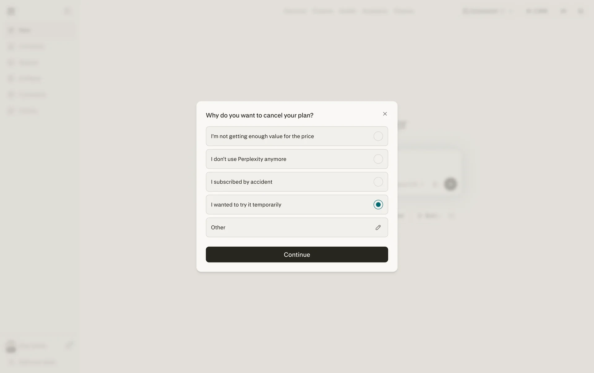 Cancel-reason dialog headed "Why do you want to cancel your plan?" with I wanted to try it temporarily selected and the Continue button enabled