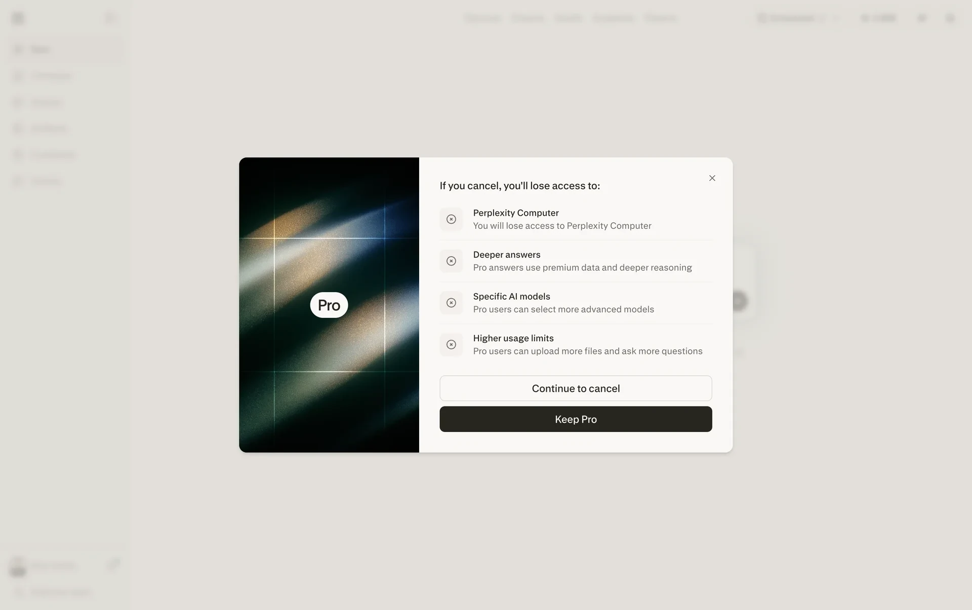 Save-offer dialog listing Perplexity Computer, Deeper answers, Specific AI models, and Higher usage limits, with an outline Continue to cancel button above a filled Keep Pro button
