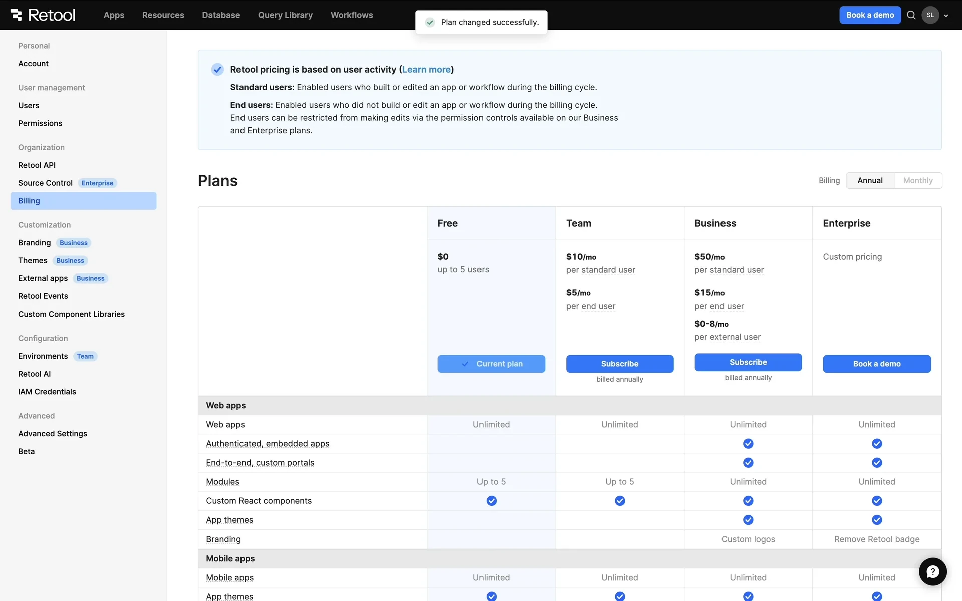 Retool Billing page after downgrade with a Plan changed successfully toast and the Free column marked Current plan at $0 up to 5 users