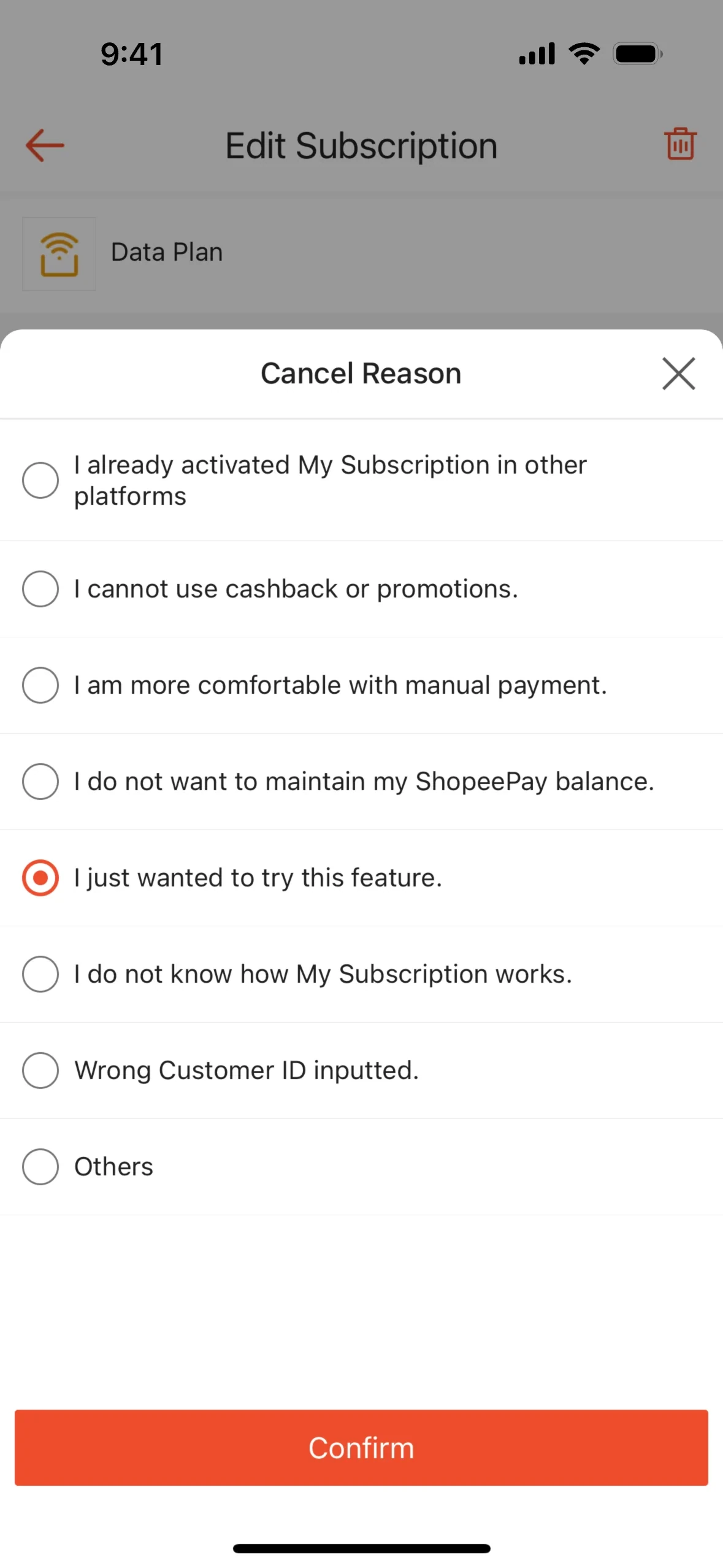 Cancel Reason sheet with I just wanted to try this feature selected and the orange Confirm button enabled; other radios include cashback, manual payment, ShopeePay balance, and Others