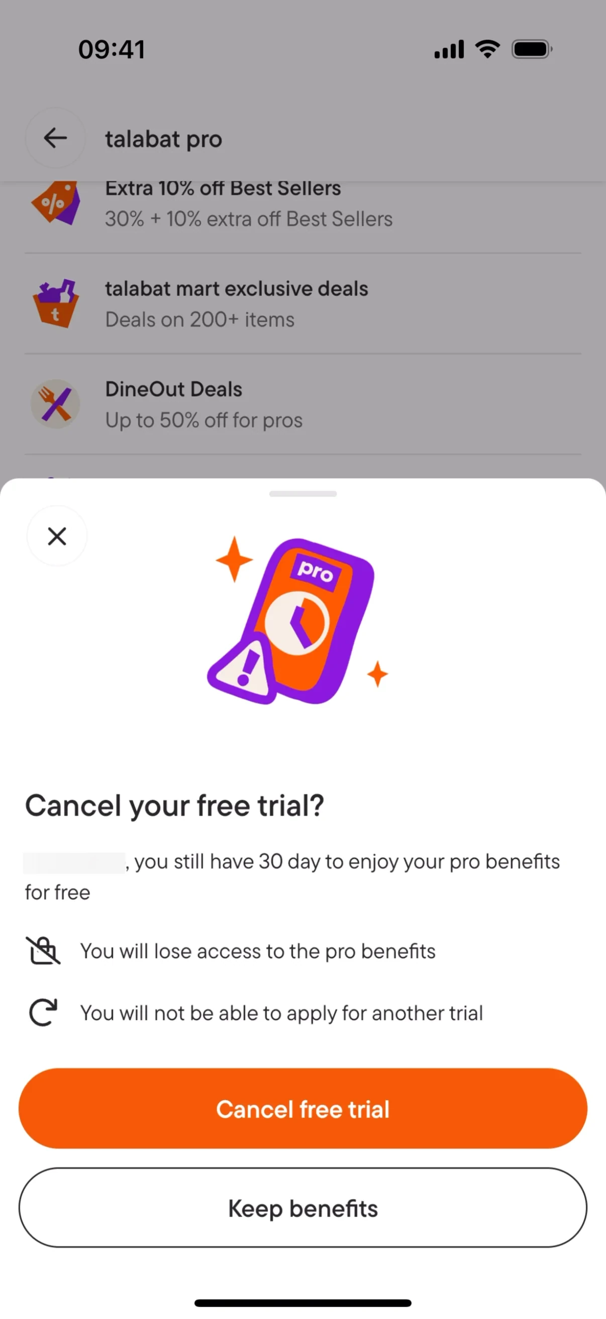 Bottom sheet titled Cancel your free trial? with warnings about losing Pro benefits and not getting another trial, an orange Cancel free trial button, and an outlined Keep benefits button