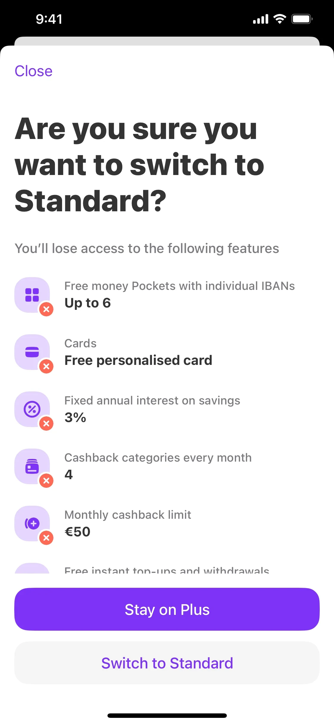 Vivid retention screen headed Are you sure you want to switch to Standard with a features-you-lose list and a purple Stay on Plus button above a grey Switch to Standard button