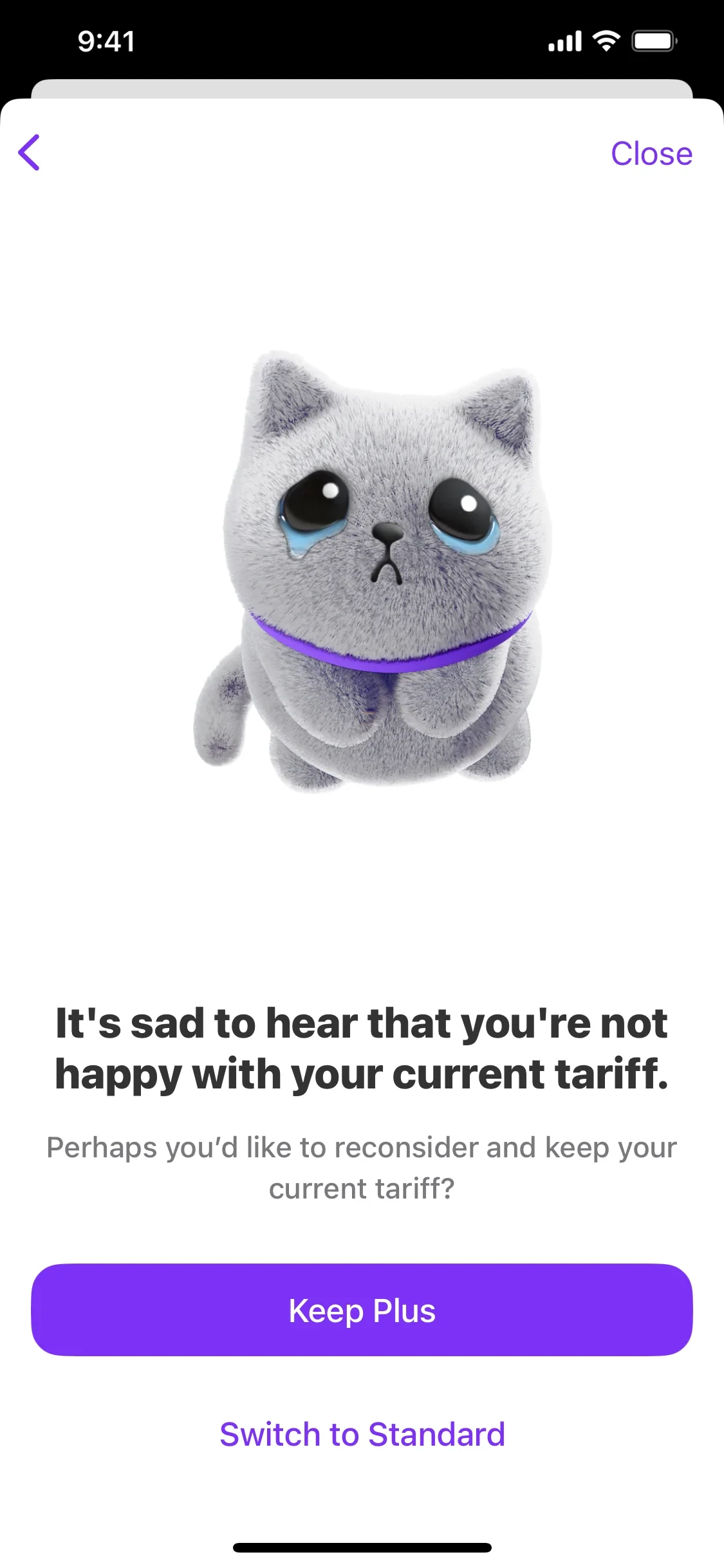 Vivid retention screen with a sad teary cat mascot, the heading It's sad to hear that you're not happy with your current tariff, a purple Keep Plus button, and a Switch to Standard text link below