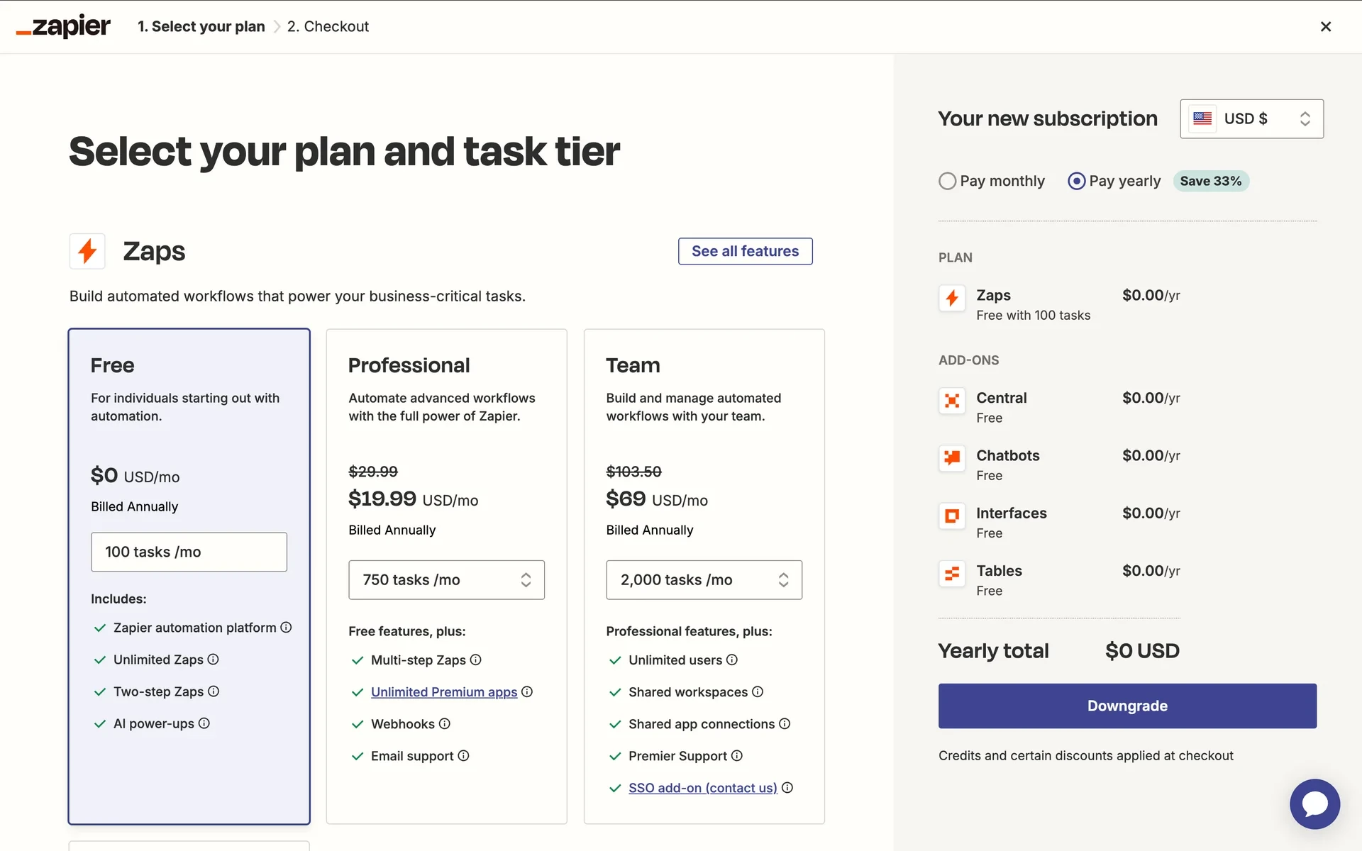 Zapier Select your plan screen with Free highlighted at $0, Professional and Team cards visible, and a purple Downgrade button showing yearly total $0
